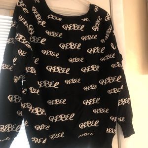 Rebel Wilson for torrid sweater